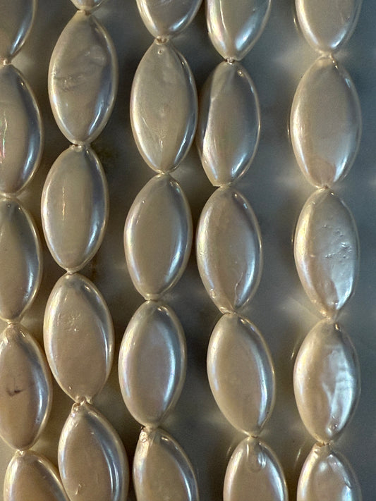 SHELL PEARL (MADREPERLA) HORSE EYE PEARL PINK 20X10MM 1 STRAND