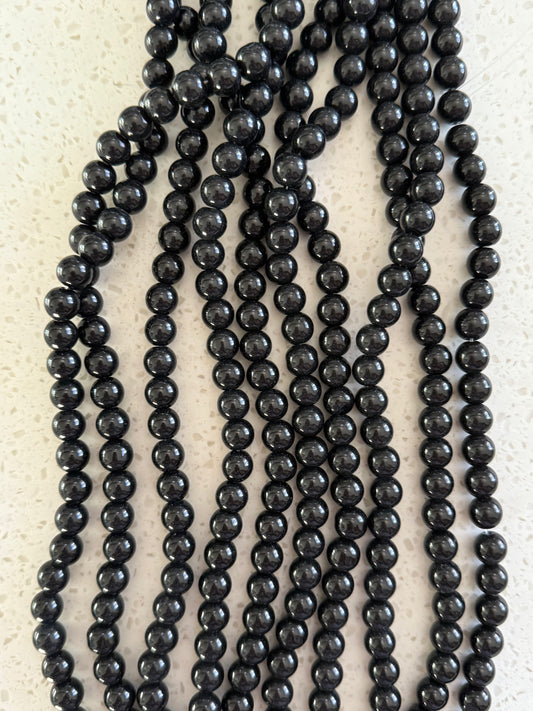 GLASS 10 MM ROUND BLACK ABOUT 32 BEADS PER 1 STRAND