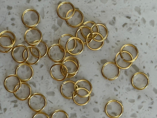 JUMPRING 7MM STAINLESS STEEL GOLD PLATED 24 KT 20 GA 50 PC