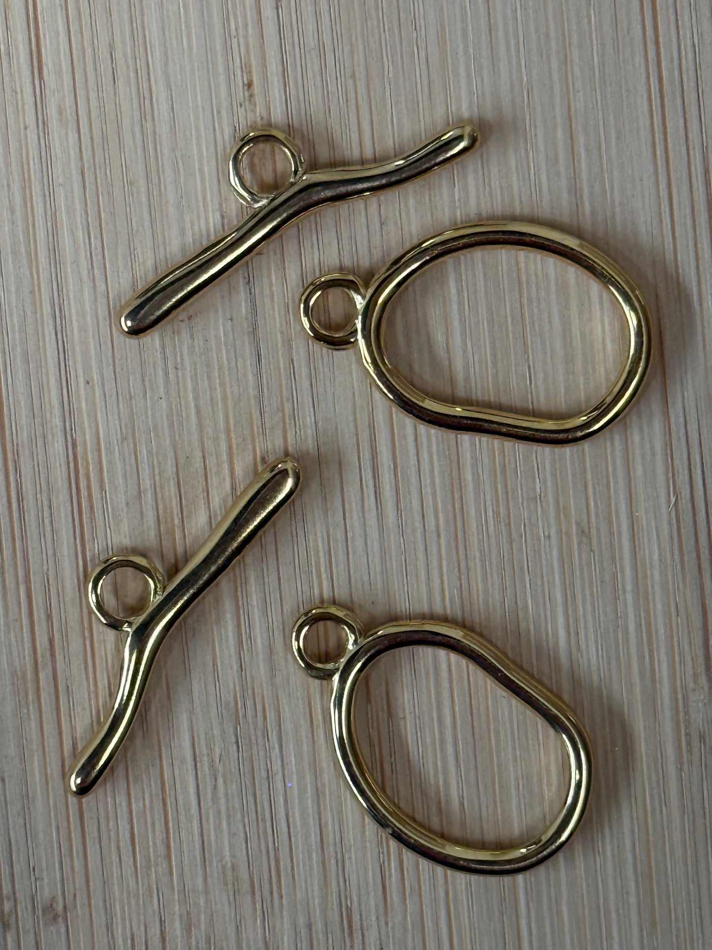 TOGGLE CLASP OVAL 25X15MM STAINLESS STEEL GOLD PLATED 18 KT 2 SETS