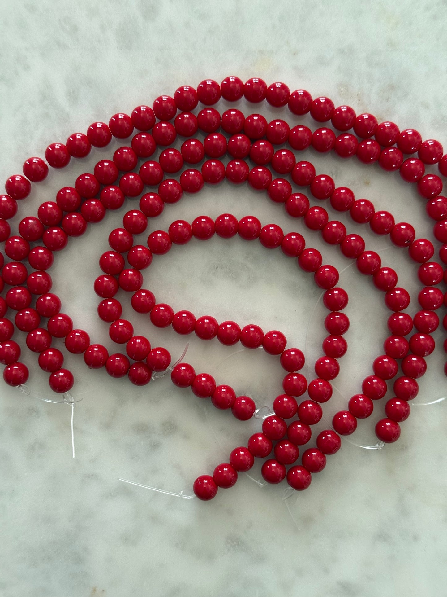 GLASS BEAD 8MM ROUND SMOOTH FIREBRICK ABOUT 36 BEADS IN 1 STRAND