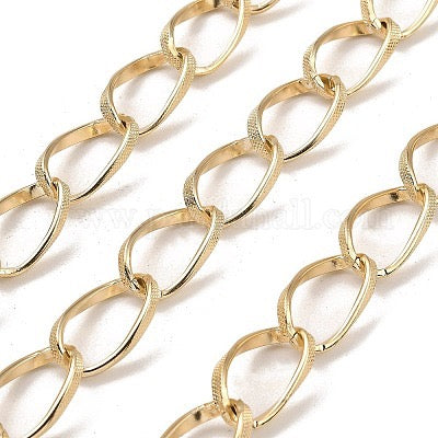 CHAIN ALUMINUM CURLS LIGHT GOLD PER YARD