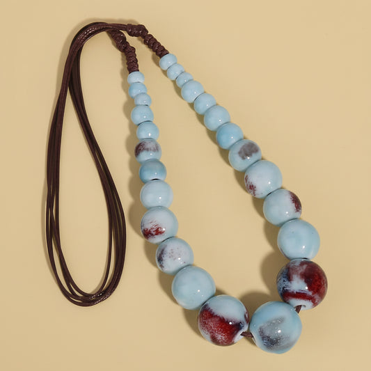 CERAMIC NECKLACE WITH BROWN LEATHER CORD 1 PC