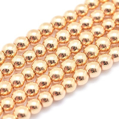 HEMATITE 10MM ROUND LIGHT GOLD PLATE ABOUT 4525 BEADS PER 1 STRAND