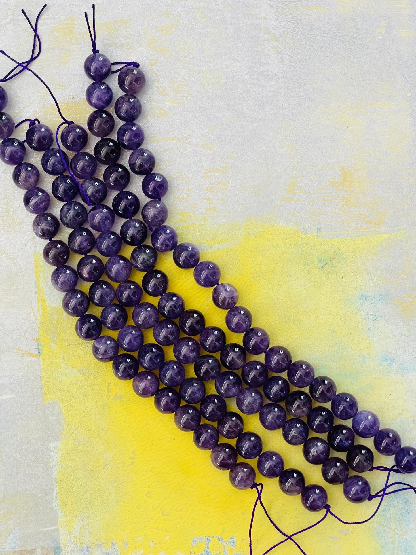 AMETHYST 10 MM ROUND 7.6 INCHES 1 STRAND