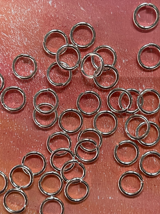 JUMPRING 8MM SST SILVER PLATE 50 PC