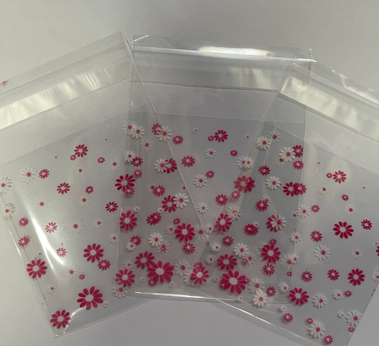 Bag cello 10x6 cm dark pink flowers 100 pc