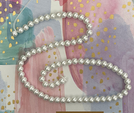GLASS PEARL 6 MM ROUND WHITE 1 STRAND APROX 72 PCS