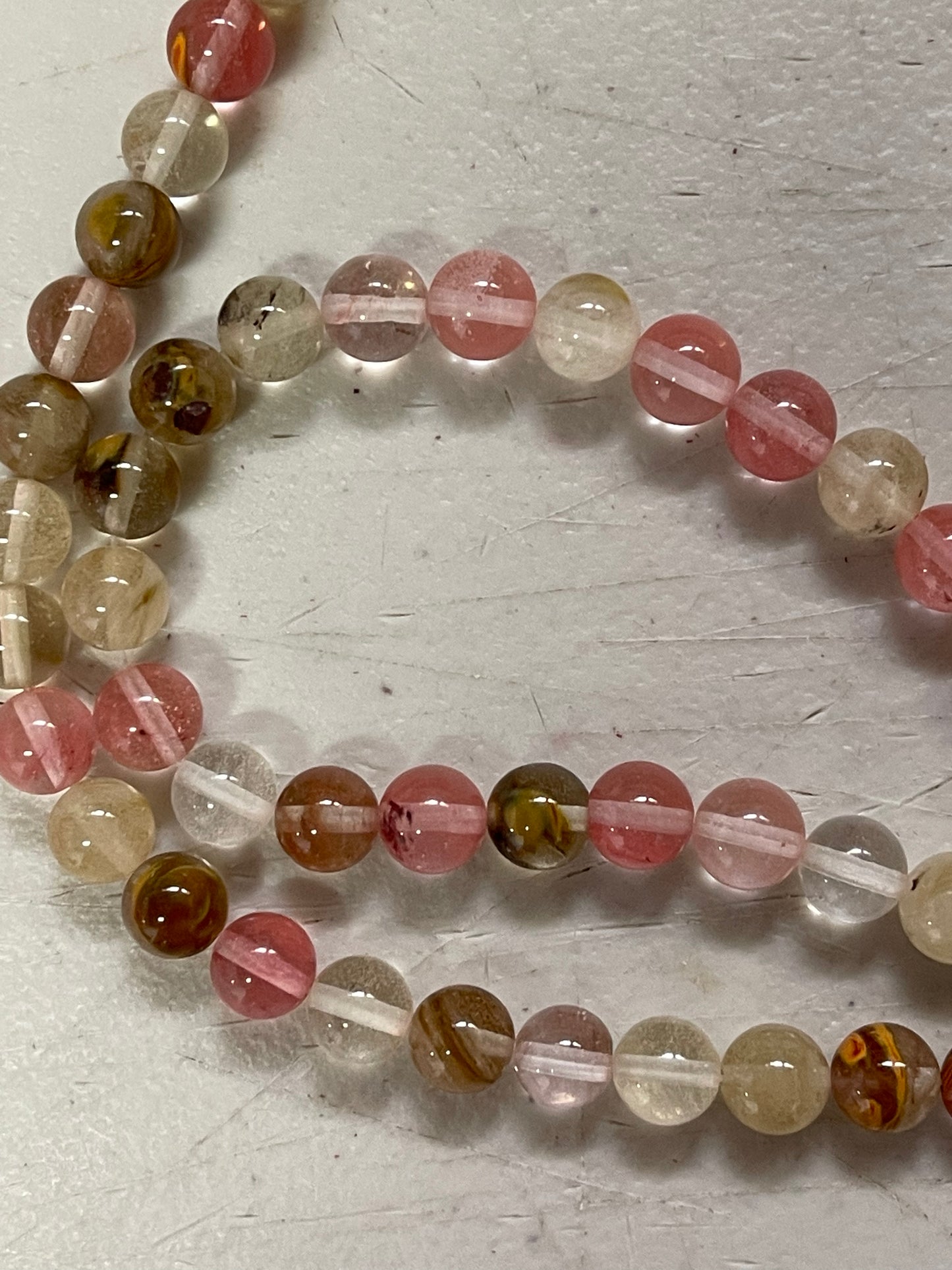 GLASS TIGERSKIN ROUND 8MM 1 STRAND