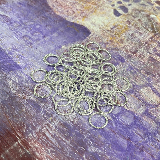 JUMPRING 12MM SILVER PLATE 18 GA 10 PC