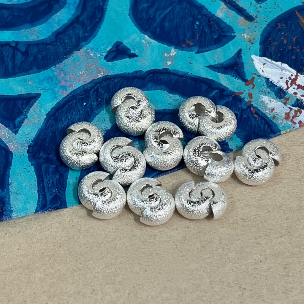CRIMP COVER SILVER PLATE 7X4.5MM 20 PC