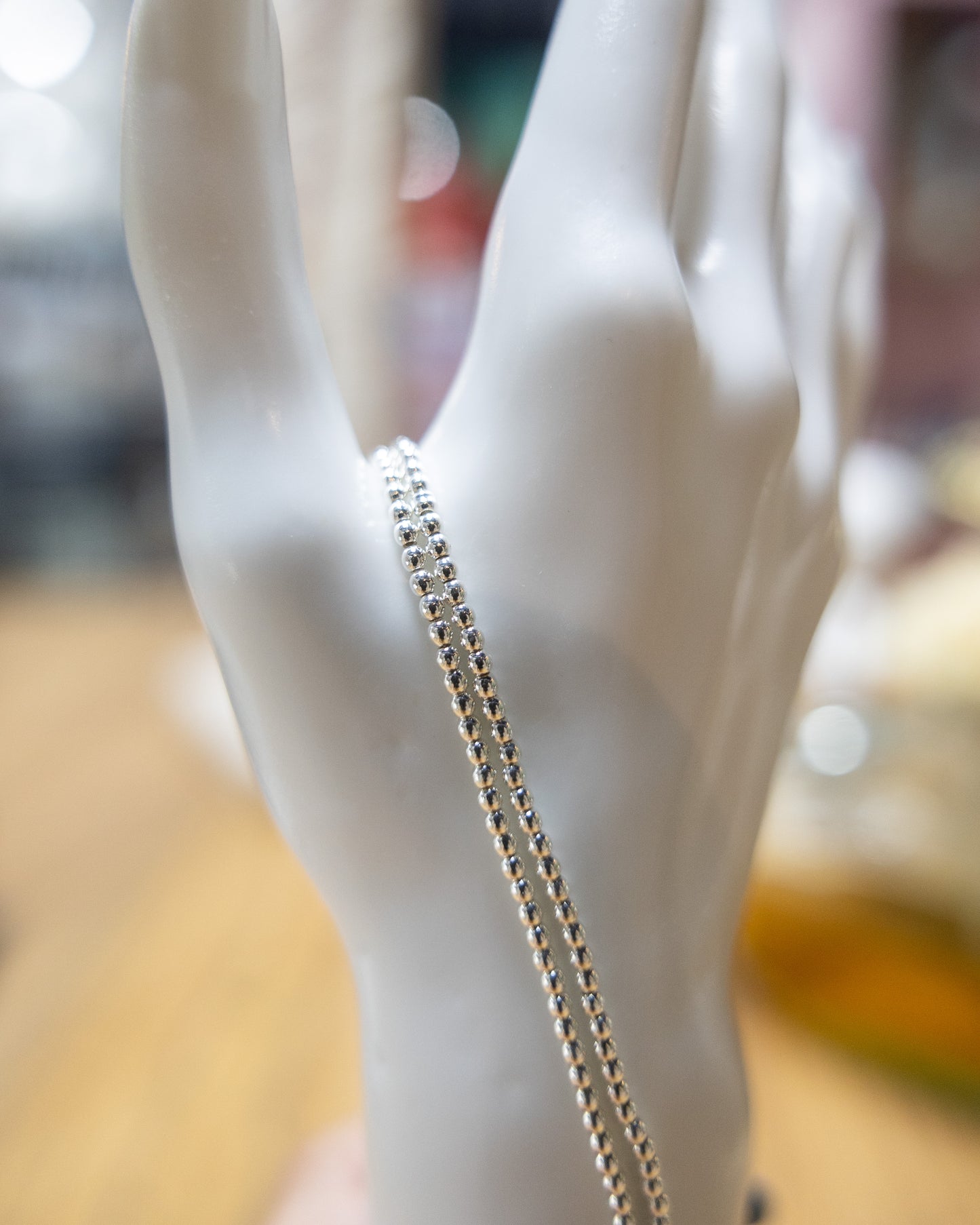 HEMATITE 2MM ROUND SILVER PLATE 1 STRAND