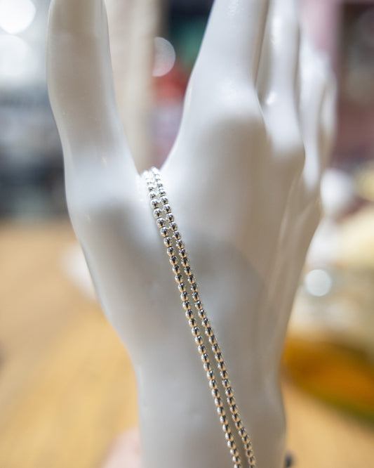 HEMATITE 2MM ROUND SILVER PLATE 1 STRAND