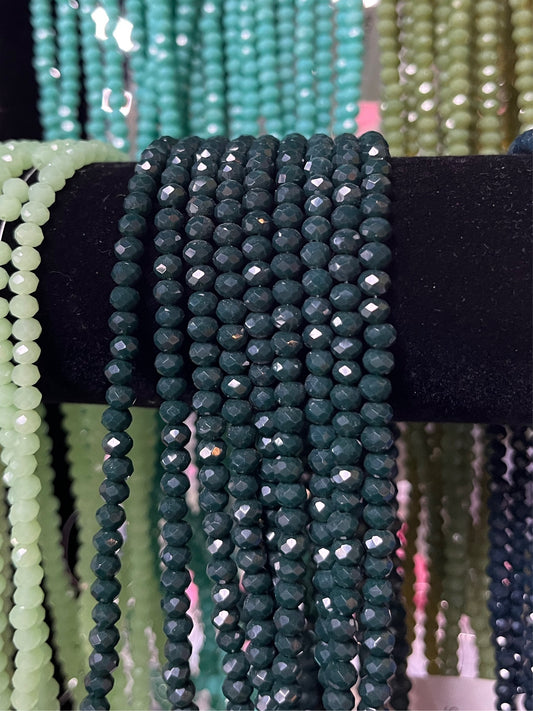 GLASS RONDELLE 4x3MM 1 STRAND