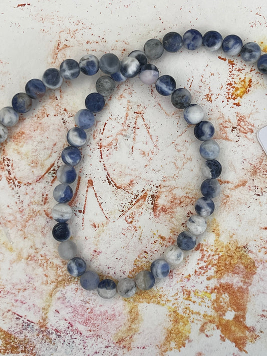 SODALITE 6MM ROUND FROSTED 1 STRAND