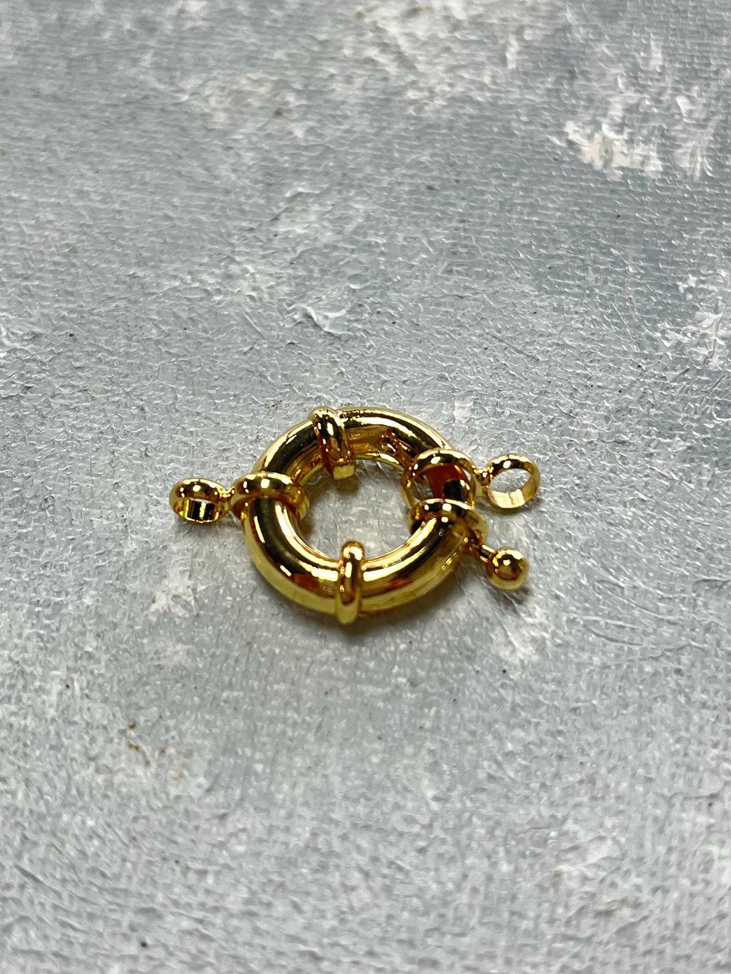 Clasp spring ring 17x6 mm GP 18kt 1 pc