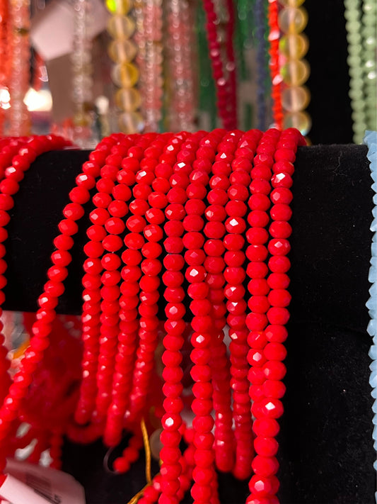 GLASS RONDELLE 4x3MM 1 STRAND