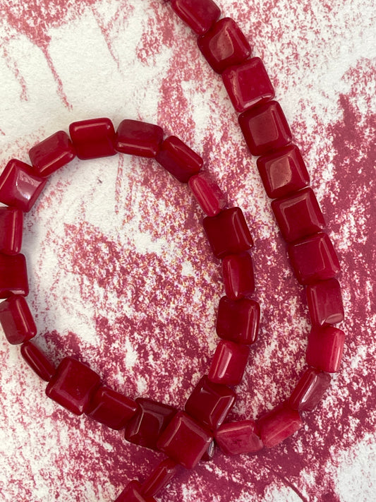 JADE 10X10MM SQUARE CRIMSON 1 STRAND