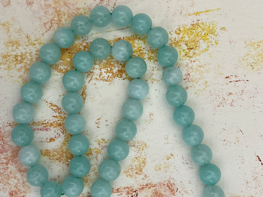 CHALCEDONY 8.5MM ROUND PALE TURQUOISE 1 STRAND
