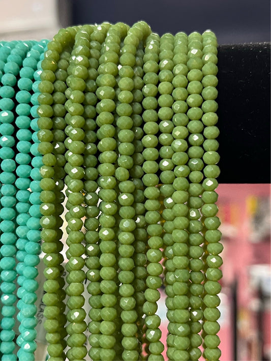 GLASS RONDELLE 4X3MM 1 STRAND