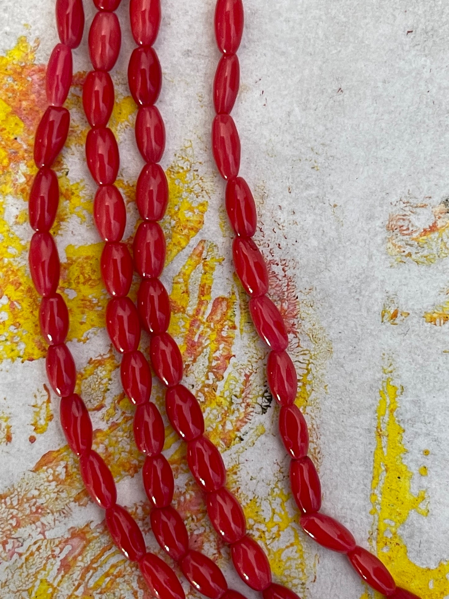 BAMBOO CORAL OVAL RICE RED 1STRAND