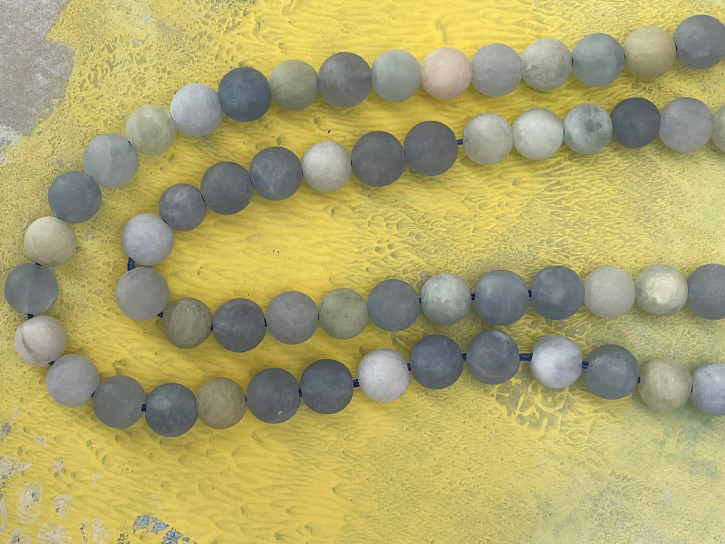 AQUAMARINE 8MM ROUND FROSTED 1 STRAND