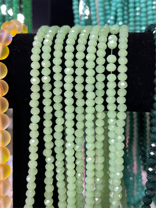 GLASS RONDELLE 4X3MM 1 STRAND