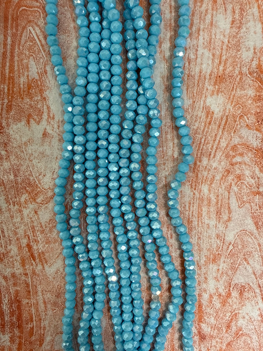 GLASS RONDELLE 6MM LIGHT SKY BLUE OPAQUE AB 1 STRAND