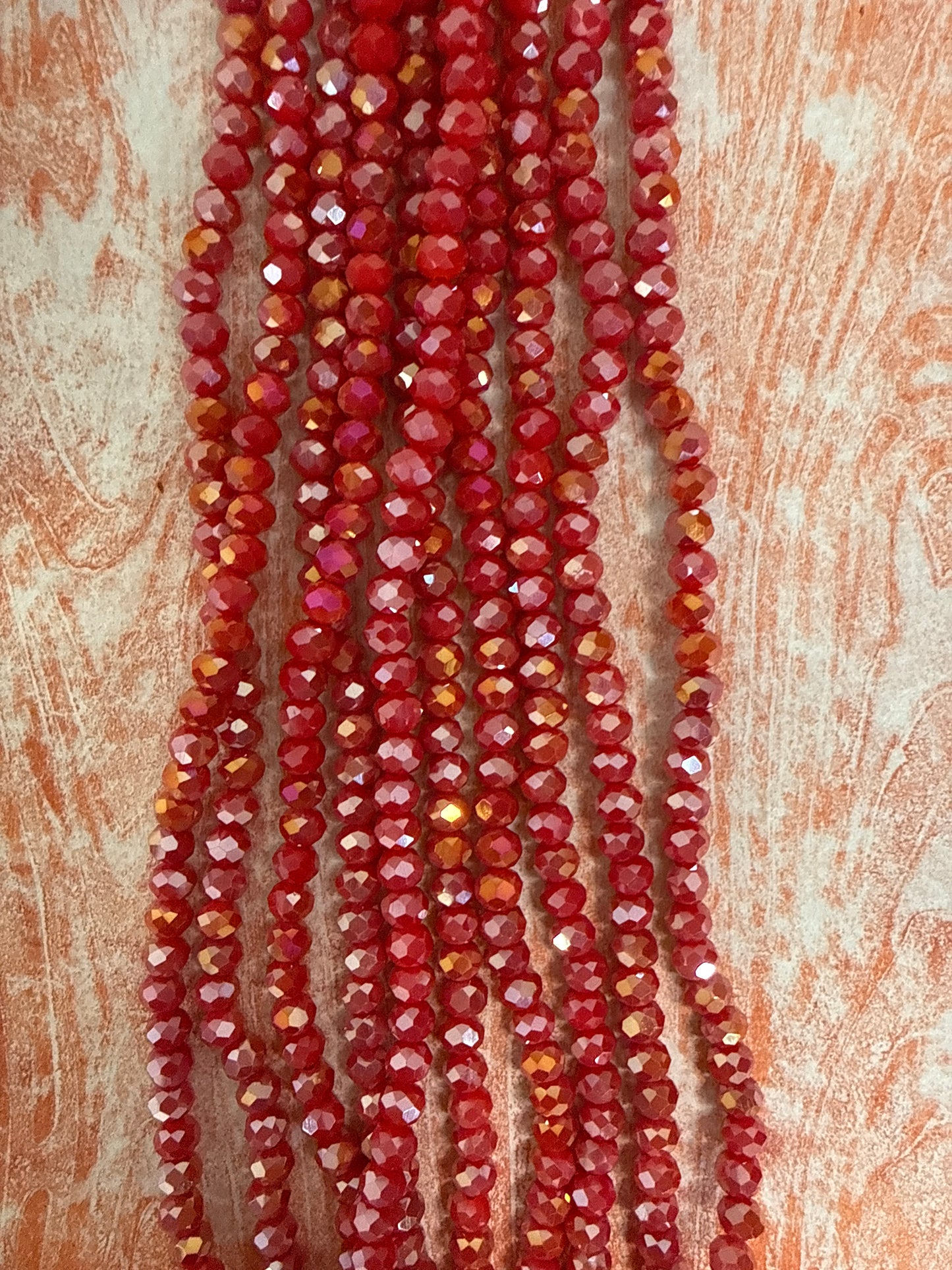 GLASS RONDELLE 6MM RED OPAQUE AB 1 STRAND