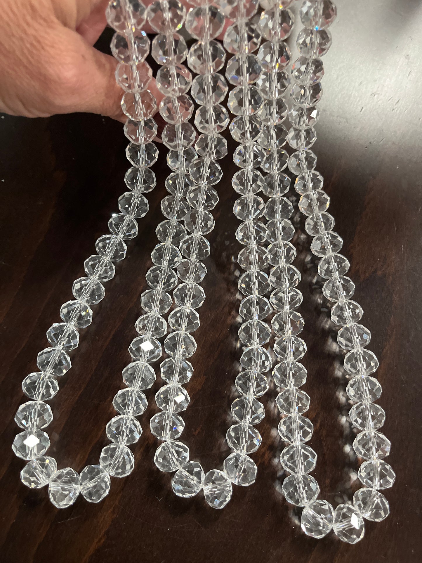 GLASS RONDELLE 14X10MM CLEAR FACETED  1 STRAND