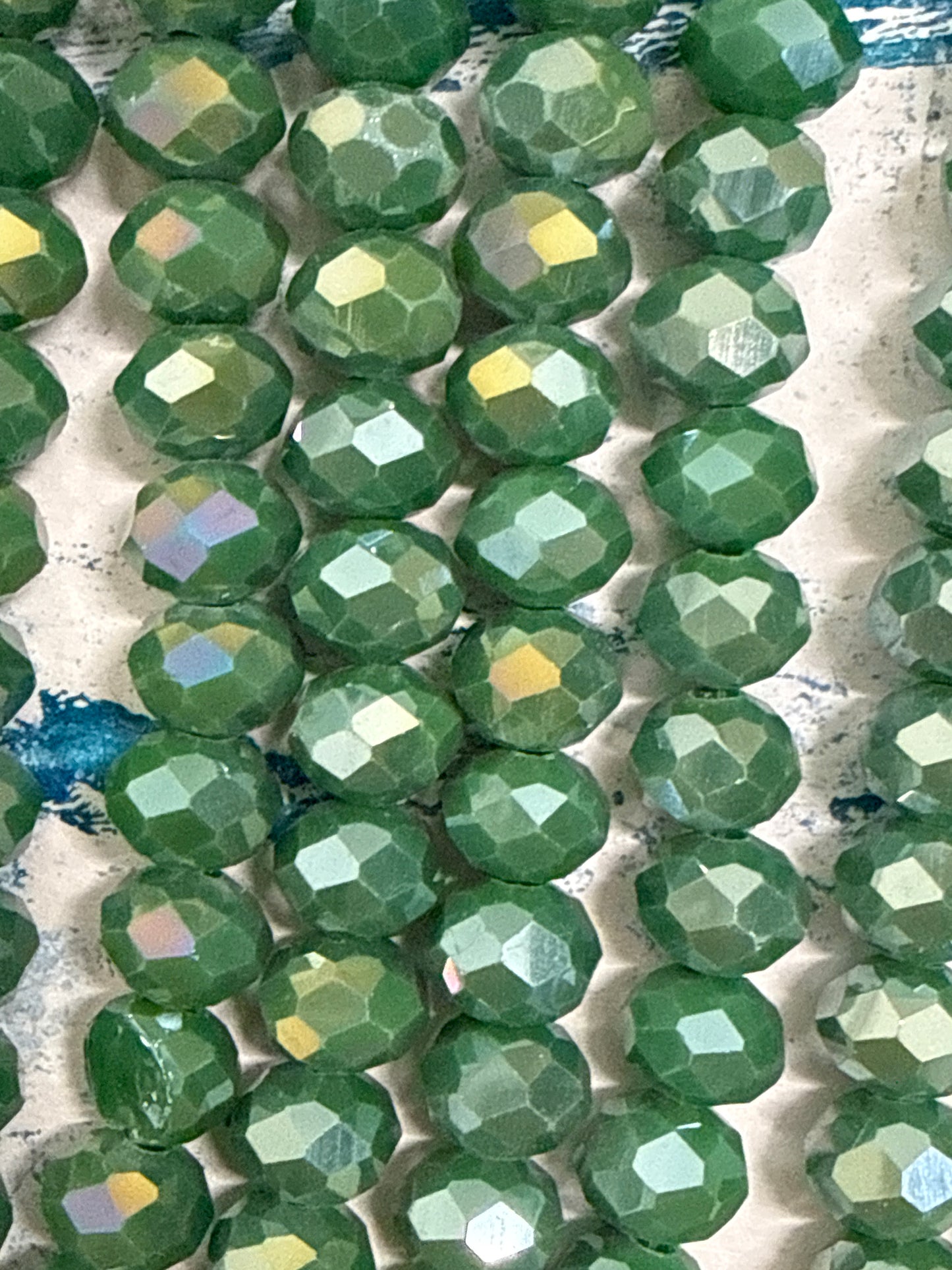 GLASS RONDELLE 8MM DARK GREEN OPAQUE AB 1 STRAND