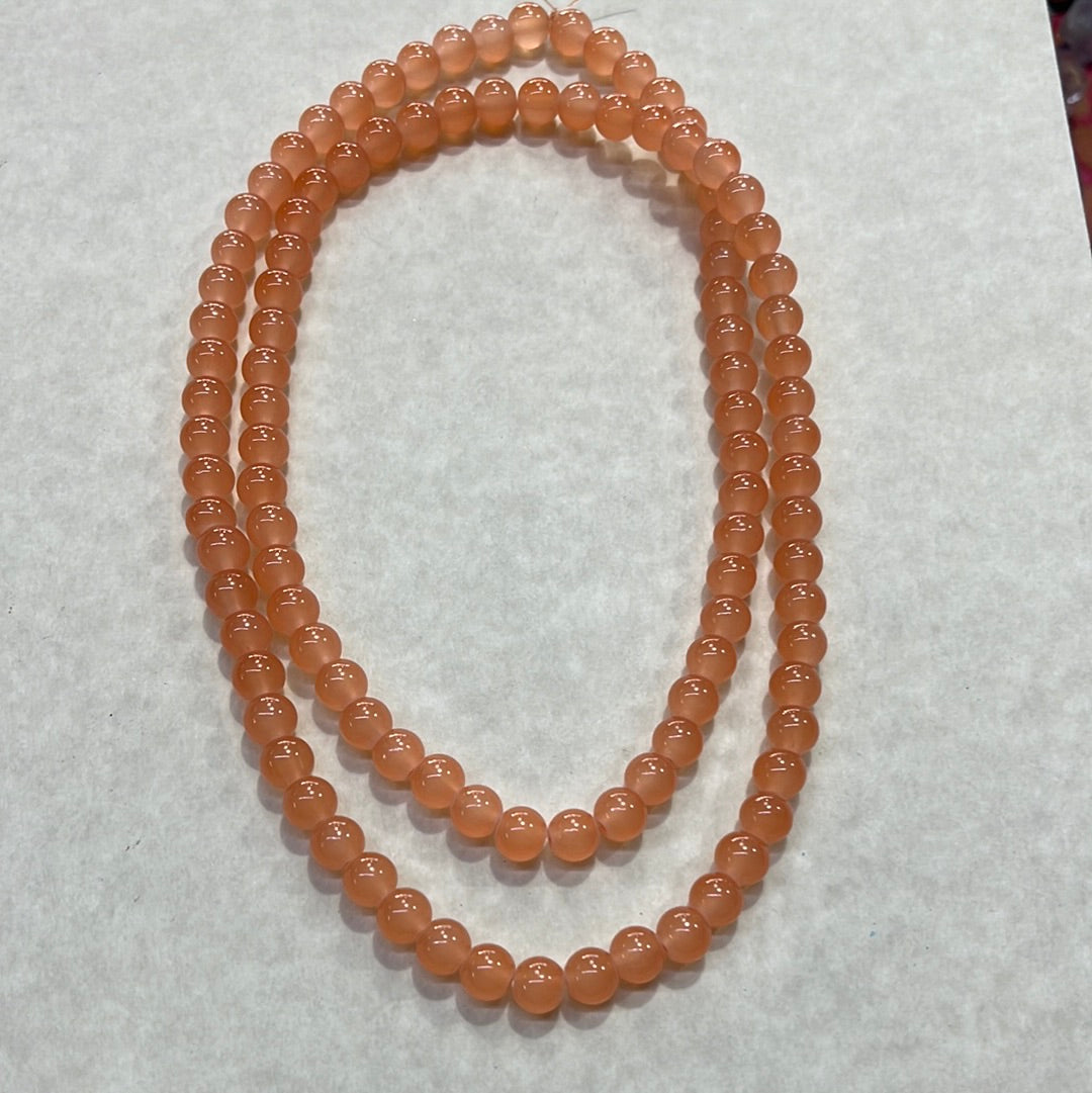 GLASS JADE 8MM ROUND LIGHT SALMON