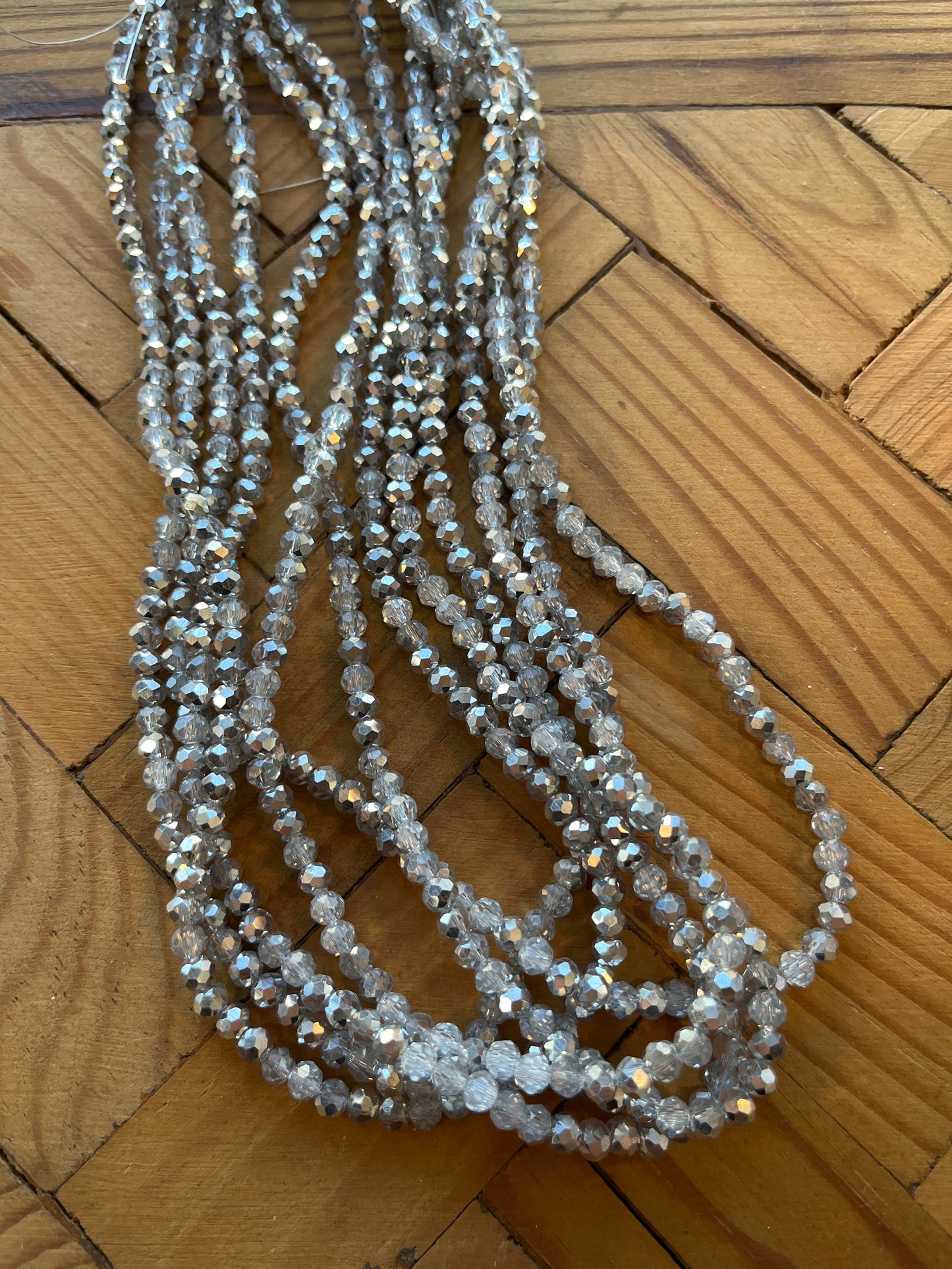 GLASS RONDELLE 4X3MM CLEAR SILVER 1 STRAND