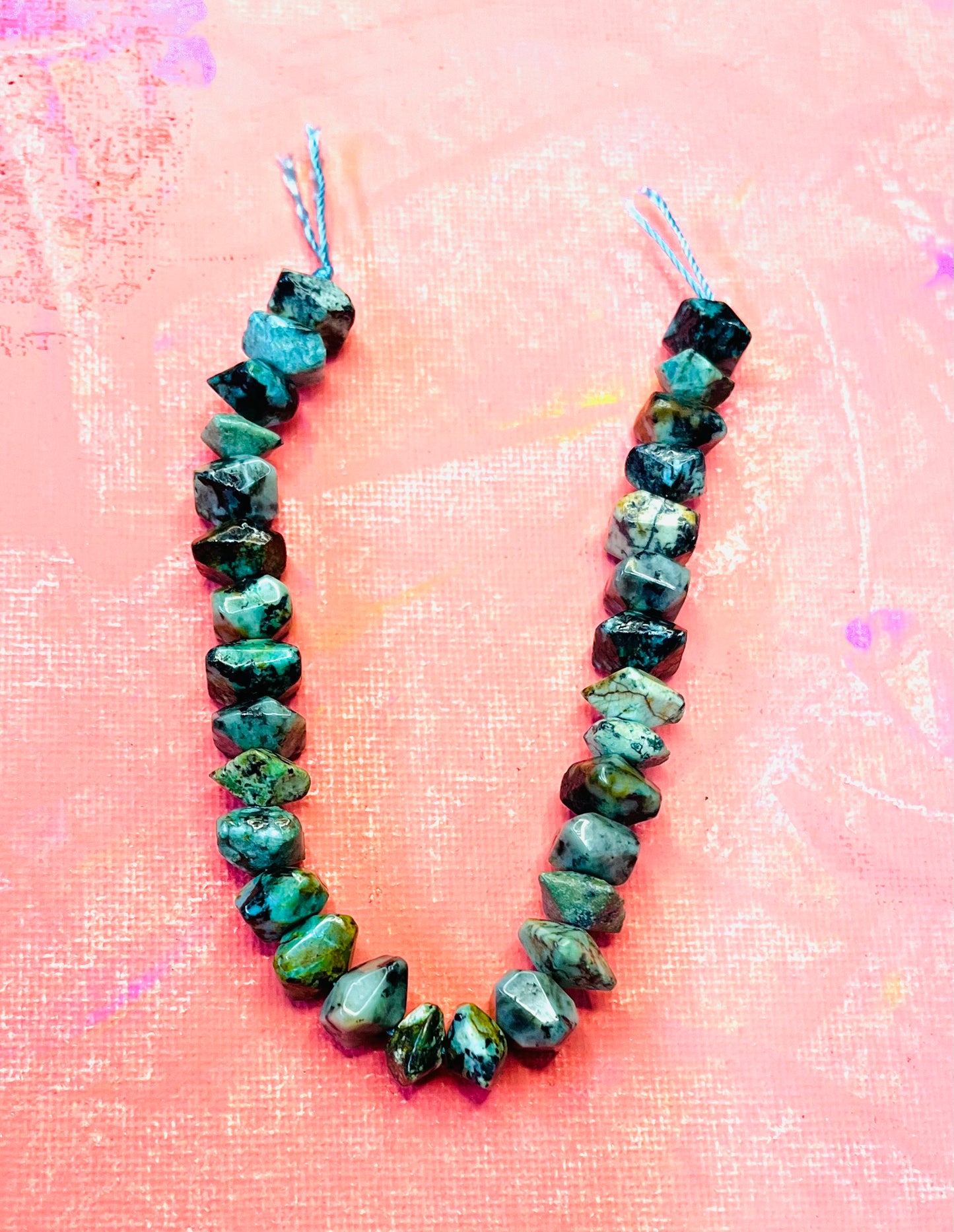 AFRICAN TURQUOISE NUGGET FACETED 9-11MM 1 STRAND ABOUT 30 PCS