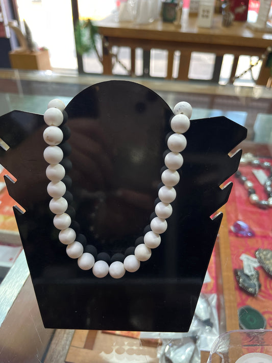 MAGNESITA NATURAL 10X9 ROUND 1 STRAND