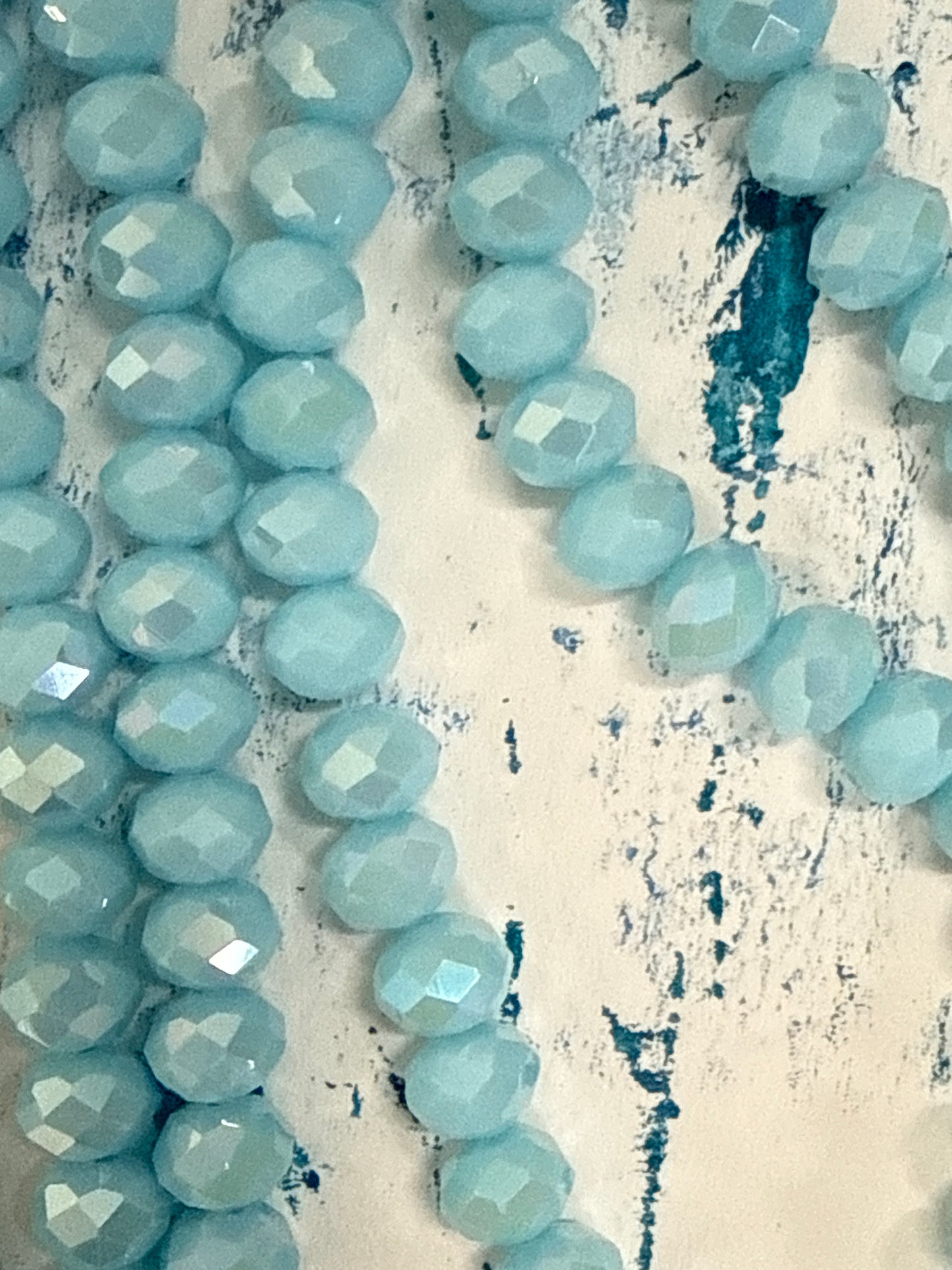 GLASS RONDELLE 8MM LIGHT AQUA AB 1 STRAND