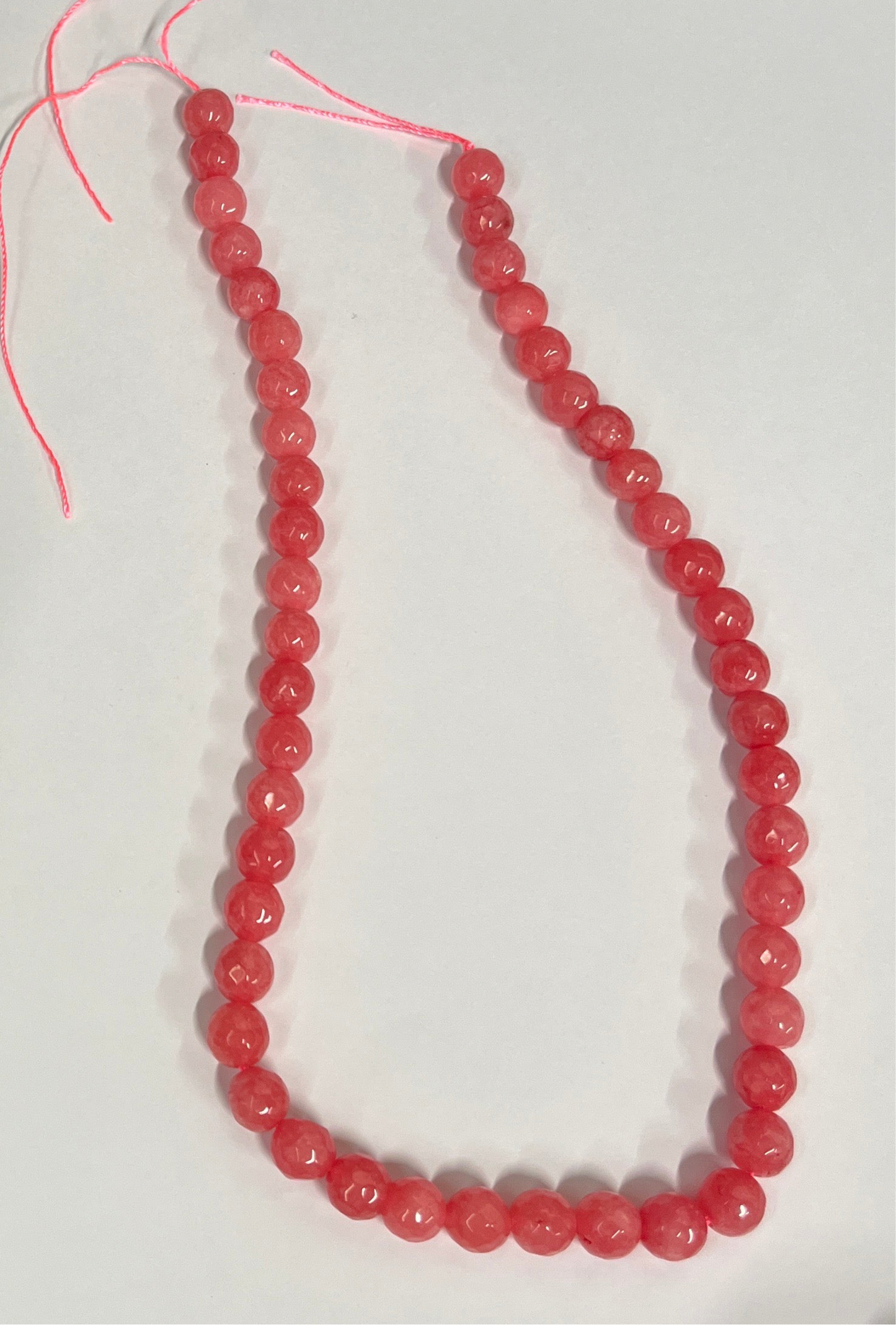 WHITE JADE 8MM ROUND LIGHT CORAL 1 STRAND