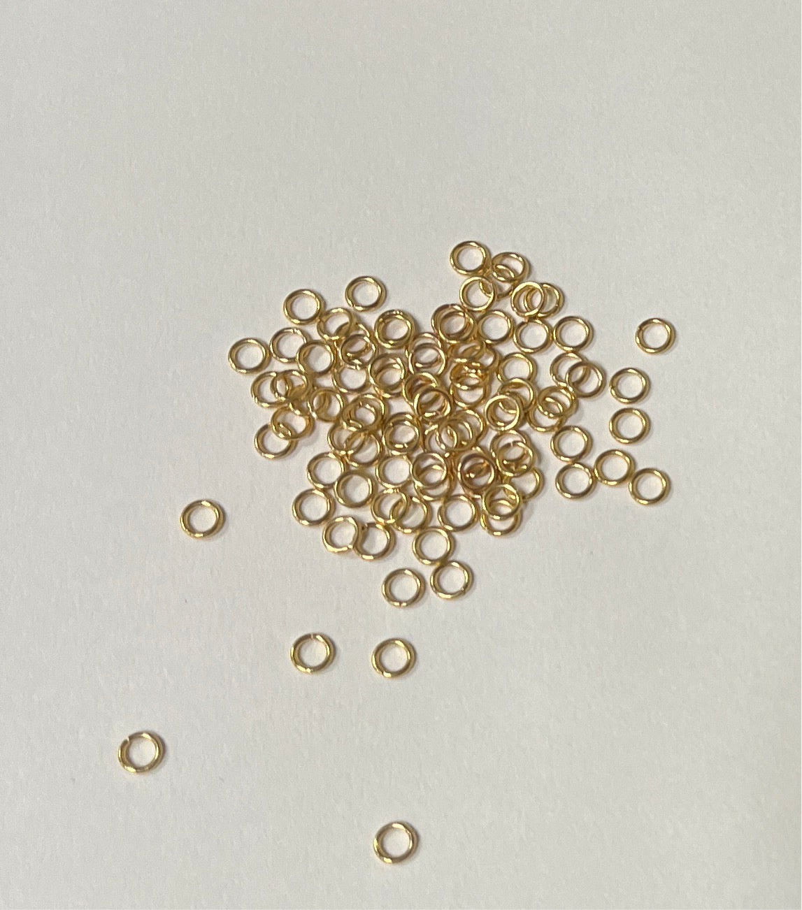 JUMPRING 4MM 21 GA STAINLESS STEEL GOLD PLATE 18 KT   50PC