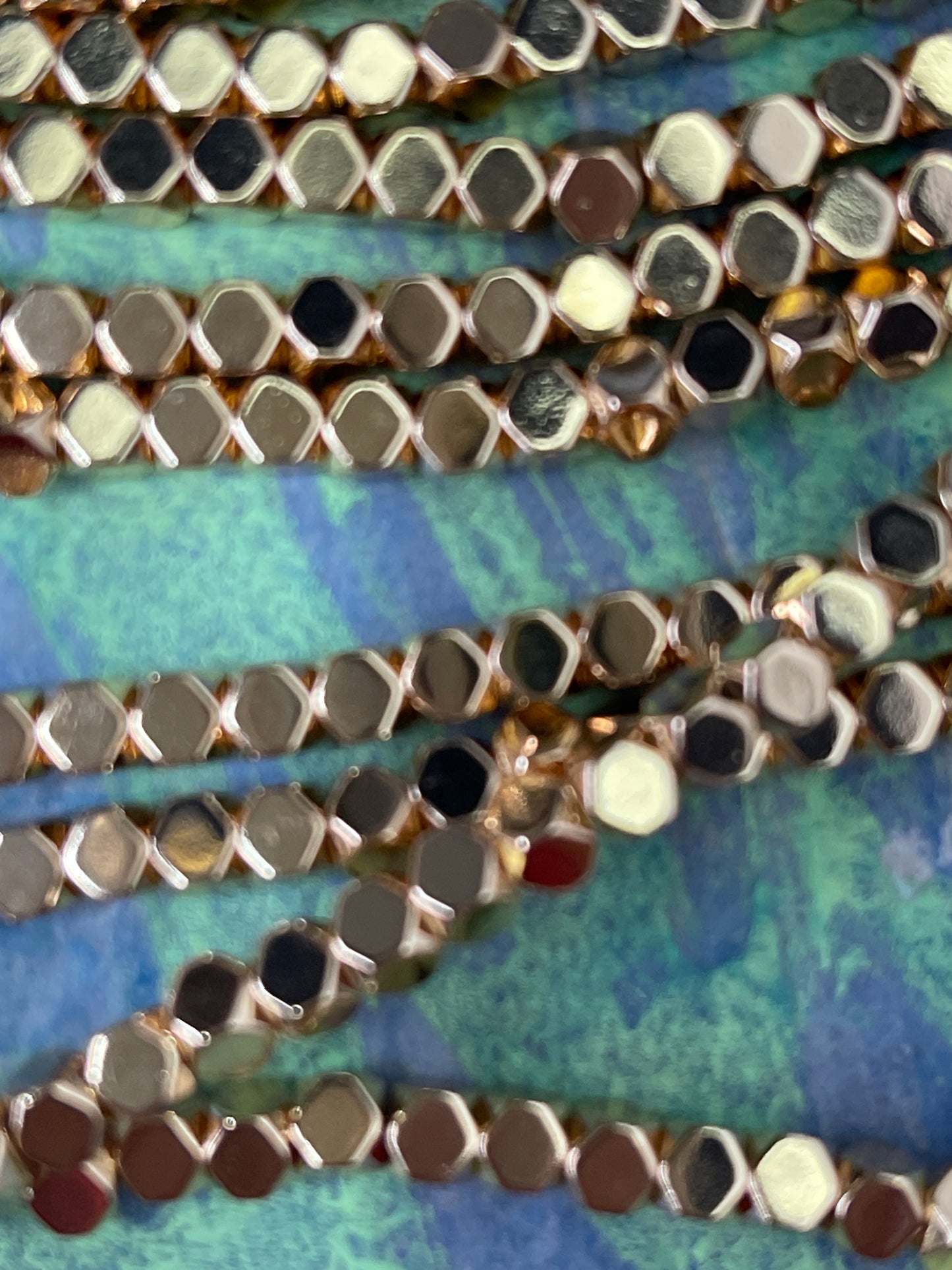 HEMATITE 4X4MM POLYGON LIGHT GOLD ABOUT 98 PC PER 1  STRAND