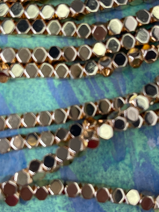 HEMATITE 4X4MM POLYGON LIGHT GOLD ABOUT 98 PC PER 1  STRAND