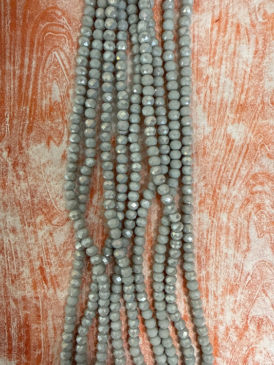 GLASS RONDELLE 6MM LIGHT GRAY OPAQUE AB 1 STRAND