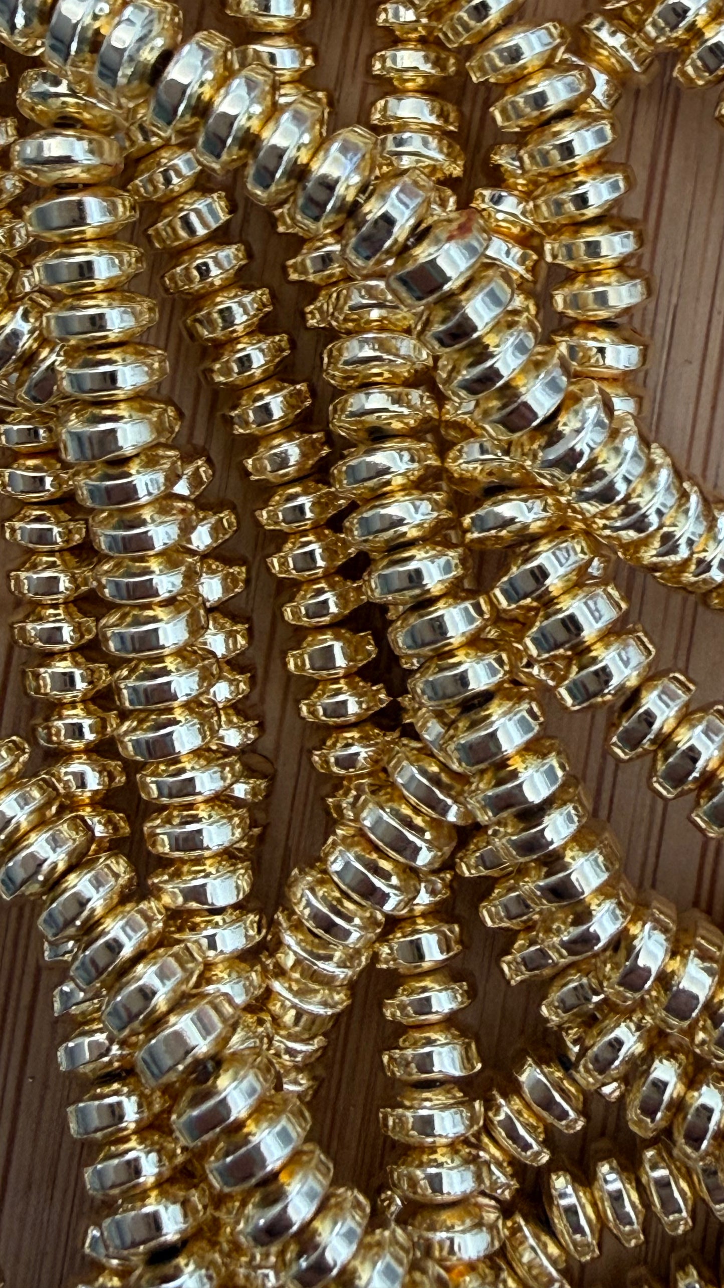 HEMATITE 4X2MM RONDELLE GOLD PLATE ABOUT 180 PC PER 1 STRAND
