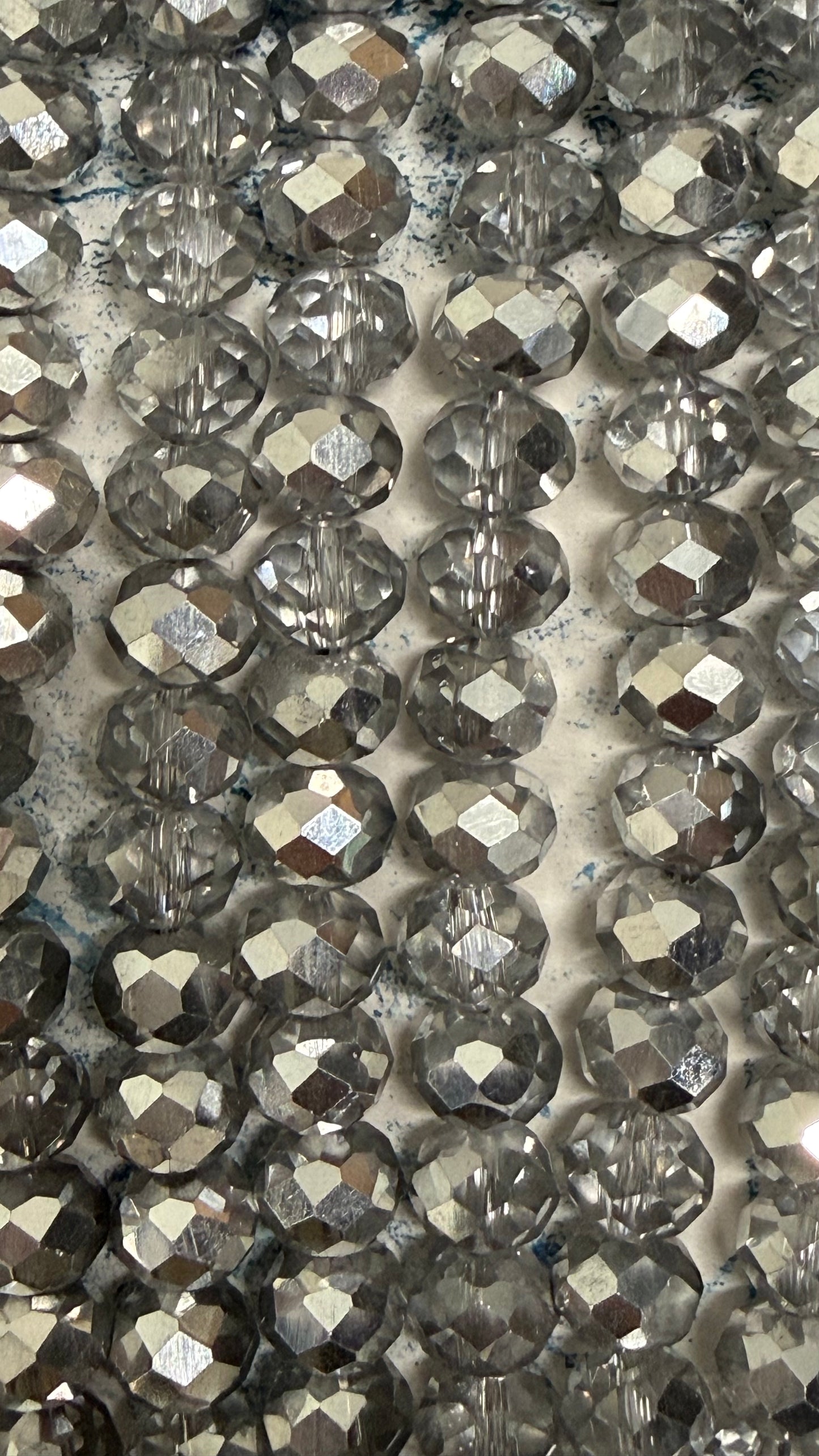 GLASS RONDELLE 8MM CLEAR HALF SILVER PLATED  1 STRAND
