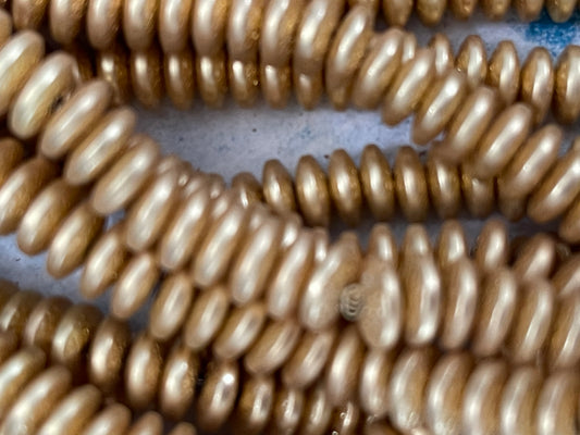 HEMATITE DISC 8X3MM  LIGHT GOLD PLATE TEXTURED 1 STRAND
