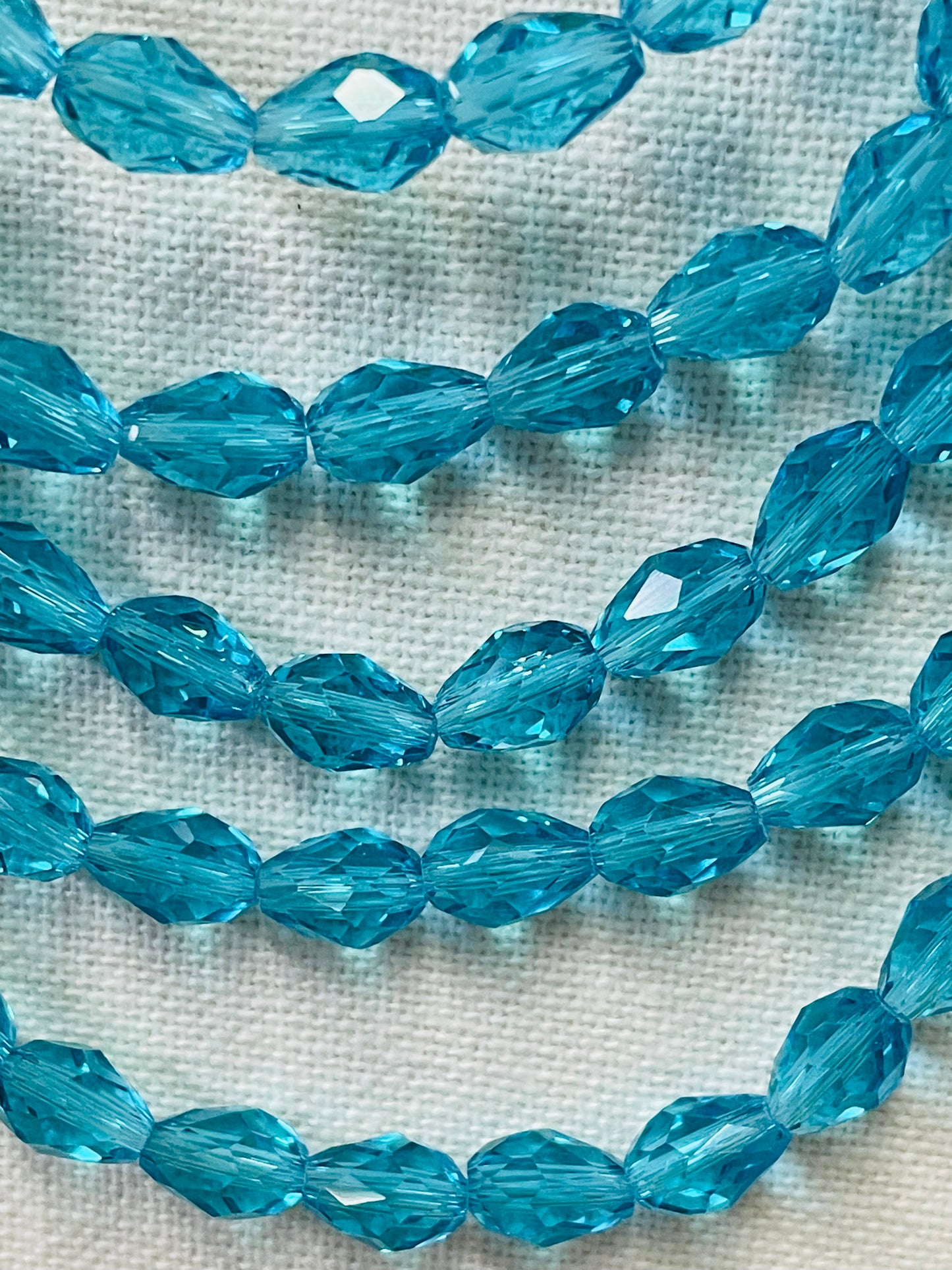 GLASS TEARDROP 11X8MM FACETED SKY BLUE 1 STRAND