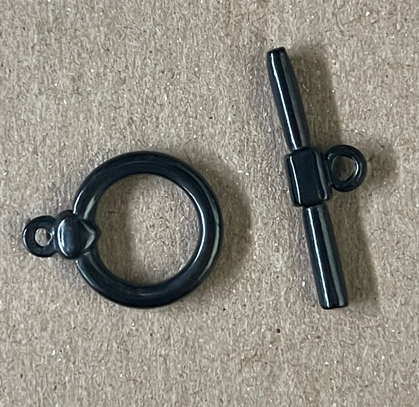TOGGLE ROUND BLACK STAINLESS STEEL 18X14MM 1 SET