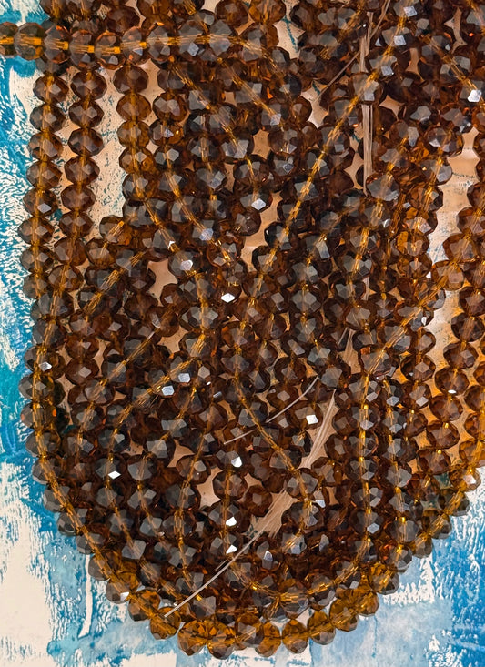 GLASS RONDELLE 8 MM DEEP AMBER CLEAR 1 STRAND