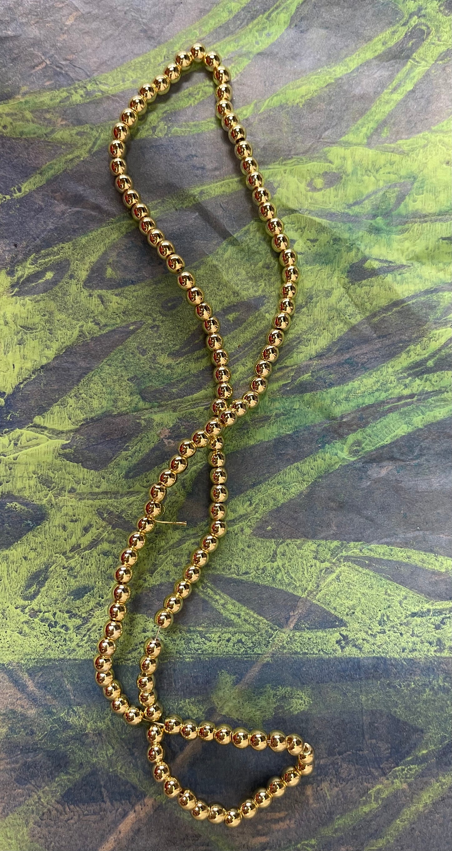 HEMATITE 4MM ROUND GOLD PLATE 1 STRAND
