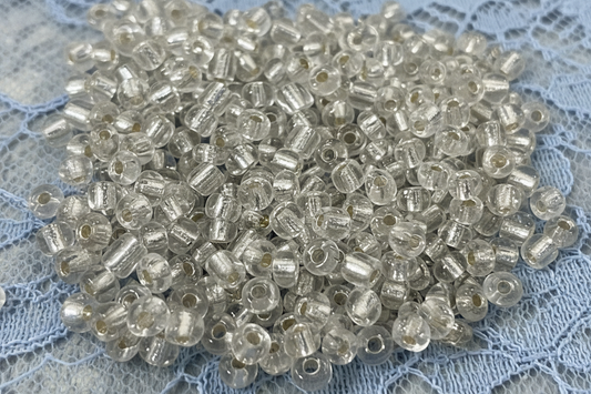SEED BEAD 6/0 4MM CLEAR SILVER 45 GM