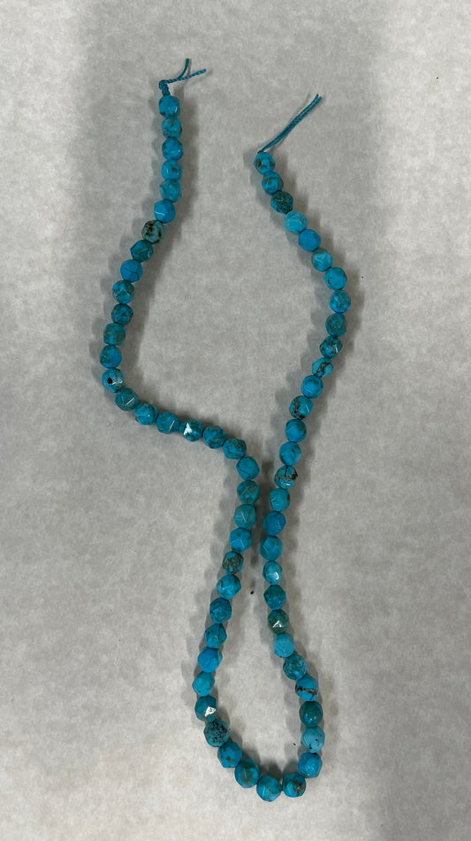 HOWLITE faceted bead